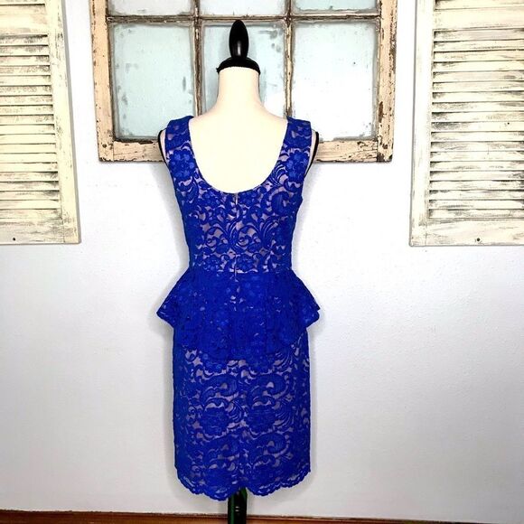 Beautiful Lace Peplum Dress by Explosion - Picture 2 of 13